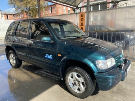Зелений Кіа Sportage, об'ємом двигуна 2 л та пробігом 176 тис. км за 5300 $, фото 1 на Automoto.ua
