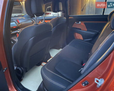 Оранжевый Киа Sportage, объемом двигателя 2 л и пробегом 282 тыс. км за 13400 $, фото 8 на Automoto.ua