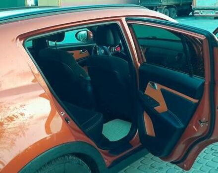 Оранжевый Киа Sportage, объемом двигателя 2 л и пробегом 282 тыс. км за 12900 $, фото 12 на Automoto.ua