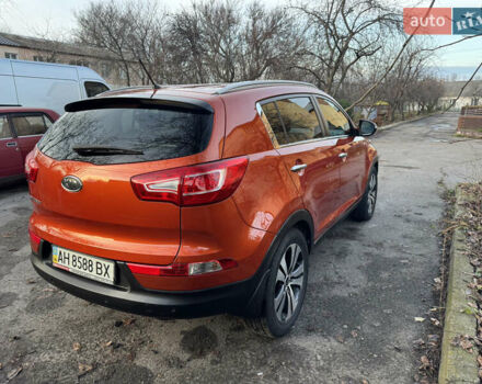 Помаранчевий Кіа Sportage, об'ємом двигуна 2 л та пробігом 101 тис. км за 13300 $, фото 6 на Automoto.ua