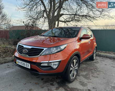 Помаранчевий Кіа Sportage, об'ємом двигуна 2 л та пробігом 101 тис. км за 13300 $, фото 1 на Automoto.ua