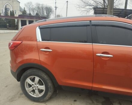 Помаранчевий Кіа Sportage, об'ємом двигуна 2 л та пробігом 240 тис. км за 12600 $, фото 2 на Automoto.ua