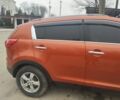 Помаранчевий Кіа Sportage, об'ємом двигуна 2 л та пробігом 240 тис. км за 12600 $, фото 2 на Automoto.ua