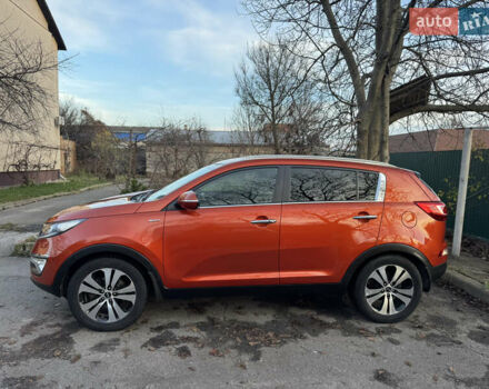 Помаранчевий Кіа Sportage, об'ємом двигуна 2 л та пробігом 101 тис. км за 13300 $, фото 2 на Automoto.ua