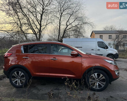 Помаранчевий Кіа Sportage, об'ємом двигуна 2 л та пробігом 101 тис. км за 13300 $, фото 7 на Automoto.ua