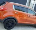 Помаранчевий Кіа Sportage, об'ємом двигуна 2 л та пробігом 128 тис. км за 15700 $, фото 1 на Automoto.ua