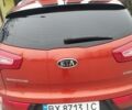 Помаранчевий Кіа Sportage, об'ємом двигуна 2 л та пробігом 240 тис. км за 12600 $, фото 3 на Automoto.ua