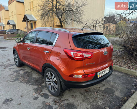 Помаранчевий Кіа Sportage, об'ємом двигуна 2 л та пробігом 101 тис. км за 13300 $, фото 4 на Automoto.ua