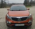 Помаранчевий Кіа Sportage, об'ємом двигуна 2 л та пробігом 240 тис. км за 12600 $, фото 1 на Automoto.ua