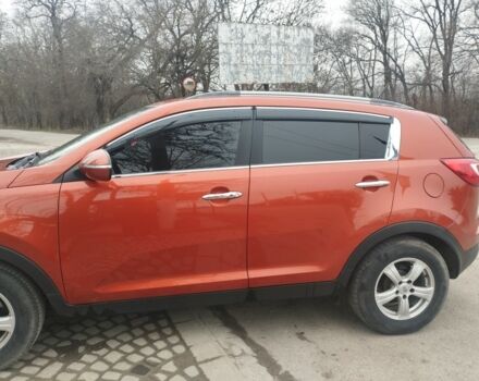 Помаранчевий Кіа Sportage, об'ємом двигуна 2 л та пробігом 240 тис. км за 12600 $, фото 17 на Automoto.ua