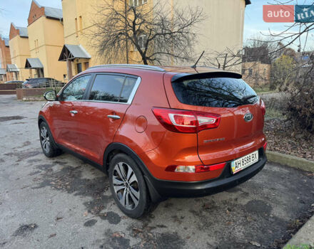Помаранчевий Кіа Sportage, об'ємом двигуна 2 л та пробігом 101 тис. км за 13300 $, фото 3 на Automoto.ua