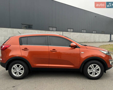 Оранжевый Киа Sportage, объемом двигателя 2 л и пробегом 143 тыс. км за 12300 $, фото 4 на Automoto.ua