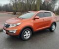Помаранчевий Кіа Sportage, об'ємом двигуна 2 л та пробігом 218 тис. км за 12700 $, фото 1 на Automoto.ua