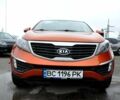 Помаранчевий Кіа Sportage, об'ємом двигуна 2.36 л та пробігом 230 тис. км за 10900 $, фото 2 на Automoto.ua