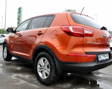 Помаранчевий Кіа Sportage, об'ємом двигуна 2.36 л та пробігом 230 тис. км за 10900 $, фото 11 на Automoto.ua