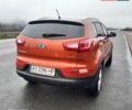 Помаранчевий Кіа Sportage, об'ємом двигуна 2 л та пробігом 218 тис. км за 12700 $, фото 1 на Automoto.ua