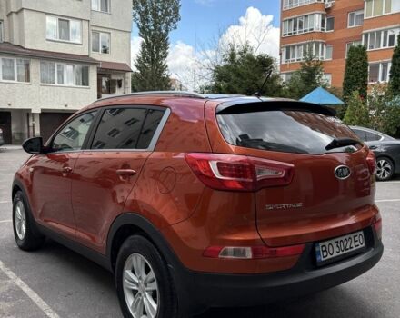 Оранжевый Киа Sportage, объемом двигателя 2 л и пробегом 197 тыс. км за 12000 $, фото 4 на Automoto.ua