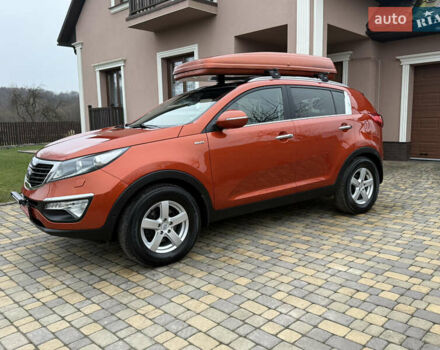 Оранжевый Киа Sportage, объемом двигателя 2 л и пробегом 195 тыс. км за 13850 $, фото 1 на Automoto.ua
