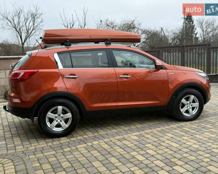 Оранжевый Киа Sportage, объемом двигателя 2 л и пробегом 195 тыс. км за 13850 $, фото 5 на Automoto.ua