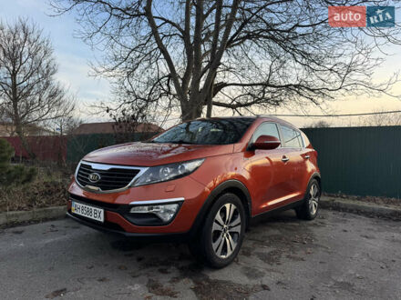 Помаранчевий Кіа Sportage, об'ємом двигуна 2 л та пробігом 101 тис. км за 13300 $, фото 1 на Automoto.ua