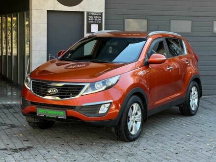 Оранжевый Киа Sportage, объемом двигателя 2 л и пробегом 190 тыс. км за 11900 $, фото 1 на Automoto.ua