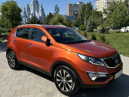 Помаранчевий Кіа Sportage, об'ємом двигуна 2 л та пробігом 144 тис. км за 13950 $, фото 1 на Automoto.ua