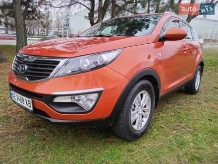 Помаранчевий Кіа Sportage, об'ємом двигуна 2 л та пробігом 168 тис. км за 10800 $, фото 1 на Automoto.ua