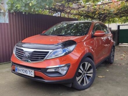 Помаранчевий Кіа Sportage, об'ємом двигуна 2 л та пробігом 169 тис. км за 15500 $, фото 1 на Automoto.ua