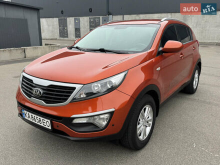 Оранжевый Киа Sportage, объемом двигателя 2 л и пробегом 143 тыс. км за 12300 $, фото 1 на Automoto.ua
