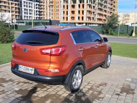 Оранжевый Киа Sportage, объемом двигателя 2 л и пробегом 217 тыс. км за 11500 $, фото 1 на Automoto.ua