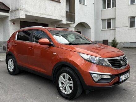 Оранжевый Киа Sportage, объемом двигателя 2 л и пробегом 197 тыс. км за 12000 $, фото 1 на Automoto.ua