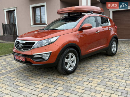 Оранжевый Киа Sportage, объемом двигателя 2 л и пробегом 195 тыс. км за 13850 $, фото 1 на Automoto.ua