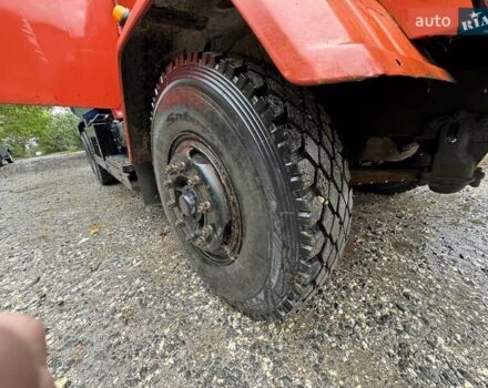 Красный КрАЗ 65055, объемом двигателя 14.86 л и пробегом 150 тыс. км за 20000 $, фото 1 на Automoto.ua