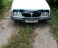 Белый Лянча 2000, объемом двигателя 2.5 л и пробегом 100 тыс. км за 556 $, фото 1 на Automoto.ua