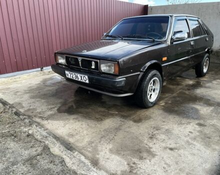 Коричневый Лянча Дельта, объемом двигателя 1.3 л и пробегом 290 тыс. км за 600 $, фото 1 на Automoto.ua