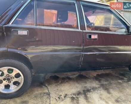 Коричневый Лянча Дельта, объемом двигателя 1.3 л и пробегом 290 тыс. км за 600 $, фото 6 на Automoto.ua