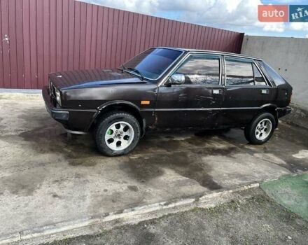 Коричневый Лянча Дельта, объемом двигателя 1.3 л и пробегом 290 тыс. км за 600 $, фото 1 на Automoto.ua