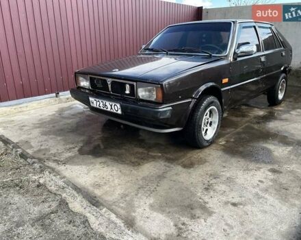 Коричневый Лянча Дельта, объемом двигателя 1.3 л и пробегом 290 тыс. км за 600 $, фото 1 на Automoto.ua