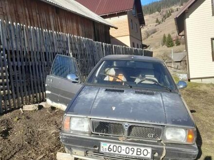 Сірий Лянча Delta, об'ємом двигуна 1.6 л та пробігом 100 тис. км за 399 $, фото 1 на Automoto.ua