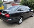 Чорний Лянча Kappa, об'ємом двигуна 2 л та пробігом 300 тис. км за 2000 $, фото 1 на Automoto.ua