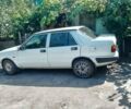 Білий Лянча Prisma, об'ємом двигуна 1.9 л та пробігом 320 тис. км за 1500 $, фото 1 на Automoto.ua