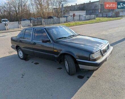Чорний Лянча Thema, об'ємом двигуна 2 л та пробігом 400 тис. км за 967 $, фото 1 на Automoto.ua