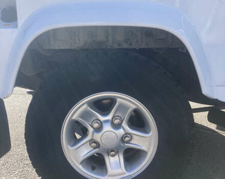 Белый Ленд Ровер Дефендер, объемом двигателя 2.4 л и пробегом 65 тыс. км за 34500 $, фото 10 на Automoto.ua