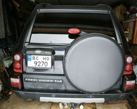 Чорний Ленд Ровер Дефендер, об'ємом двигуна 2 л та пробігом 113 тис. км за 7800 $, фото 1 на Automoto.ua