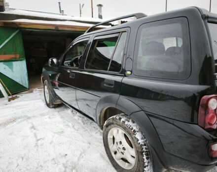 Чорний Ленд Ровер Дефендер, об'ємом двигуна 2 л та пробігом 113 тис. км за 7800 $, фото 2 на Automoto.ua