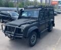 Черный Ленд Ровер Дефендер, объемом двигателя 2.4 л и пробегом 167 тыс. км за 44000 $, фото 3 на Automoto.ua