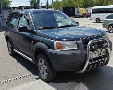 Синій Ленд Ровер Дефендер, об'ємом двигуна 2 л та пробігом 310 тис. км за 1950 $, фото 2 на Automoto.ua