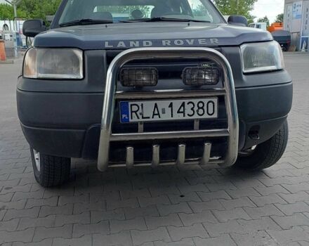 Синій Ленд Ровер Дефендер, об'ємом двигуна 2 л та пробігом 310 тис. км за 1950 $, фото 1 на Automoto.ua