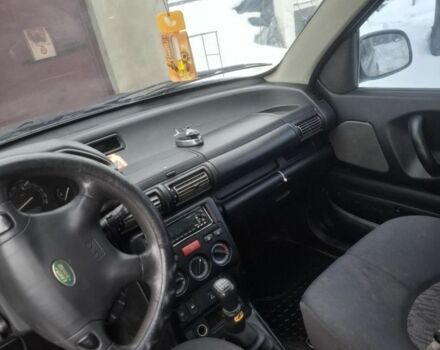 Зелений Ленд Ровер Дефендер, об'ємом двигуна 2 л та пробігом 260 тис. км за 2800 $, фото 5 на Automoto.ua