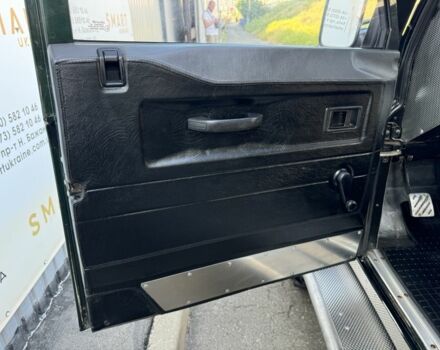 Зеленый Ленд Ровер Дефендер, объемом двигателя 2.5 л и пробегом 121 тыс. км за 18950 $, фото 10 на Automoto.ua